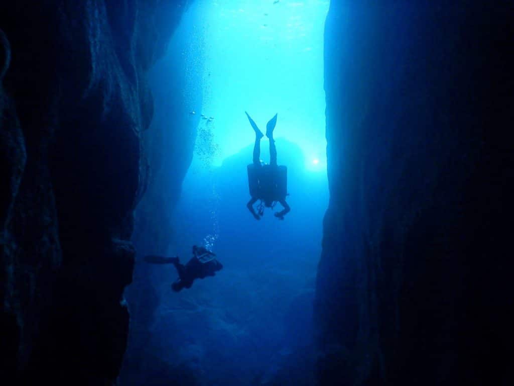 Divers in the inland sea tunnel in Malta