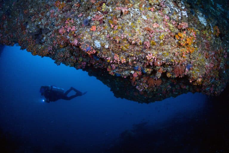 Amazing rock formations while scuba diving in warm water Lombok Indonesia