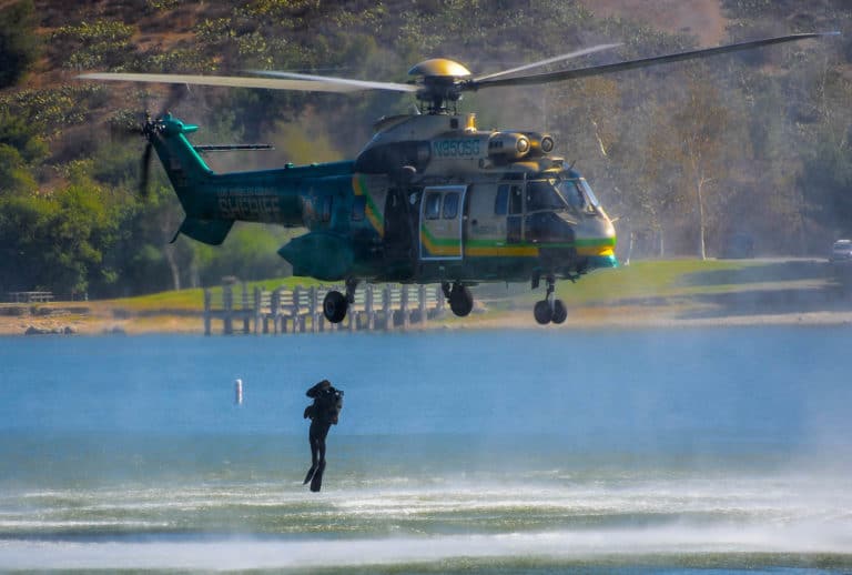 7 David Barile Public Safety Diver jumping out of a helicopter