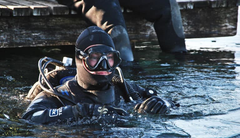 Diver getting ready on the surface. What Happens When You Hold Your Breath While Scuba Diving?