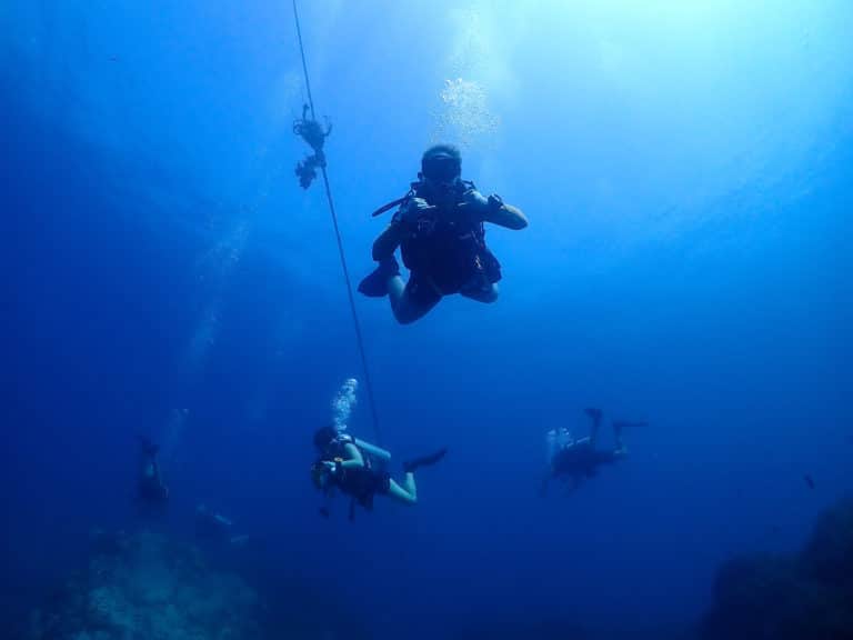 Divemasters in Thailand diving on Koh Tao. What is a typical divemaster salary?