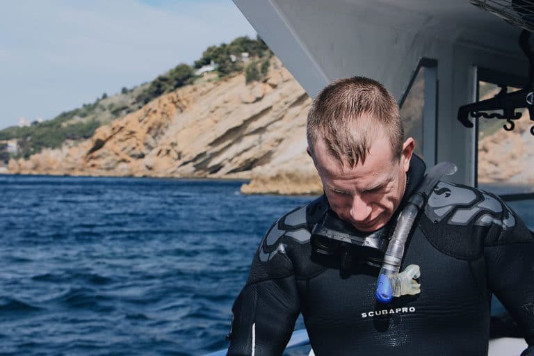 How To Clean Snorkel Gear. Snorkeler about to enter the water.