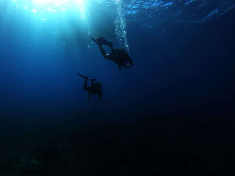 2 scuba divers descending - how deep is 47 meters?