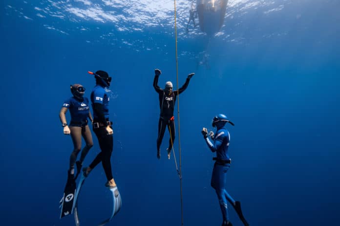 Breath-hold coach Tom Peled surrounded by his safety crew