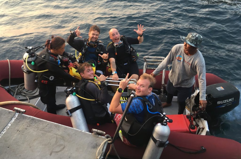 Why Do Scuba Divers Dive Backwards?