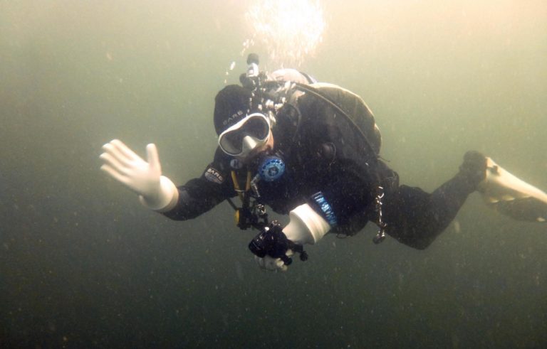 Madixx Russell diving in cold water - Canada.