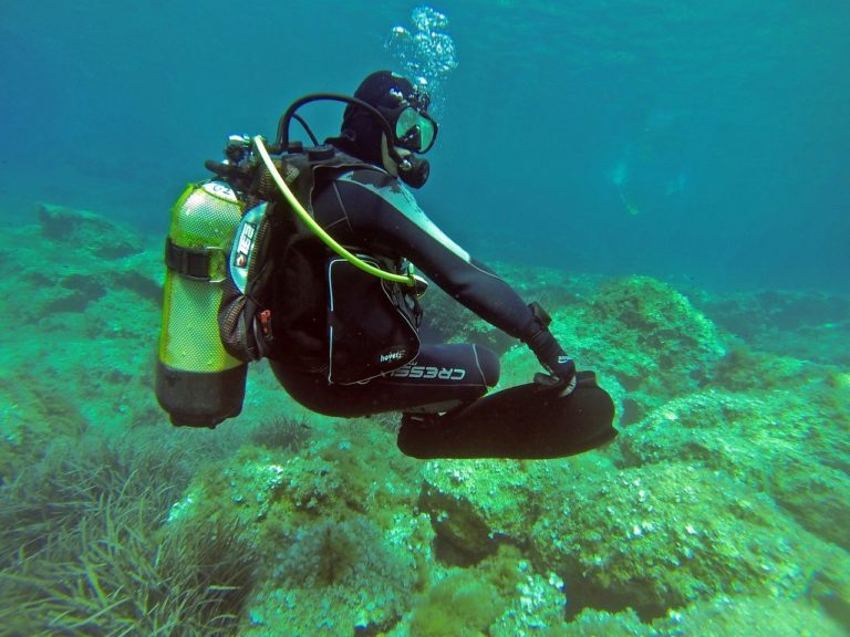 Practicing neutral buoyancy skills during the Open Water diving certification course.